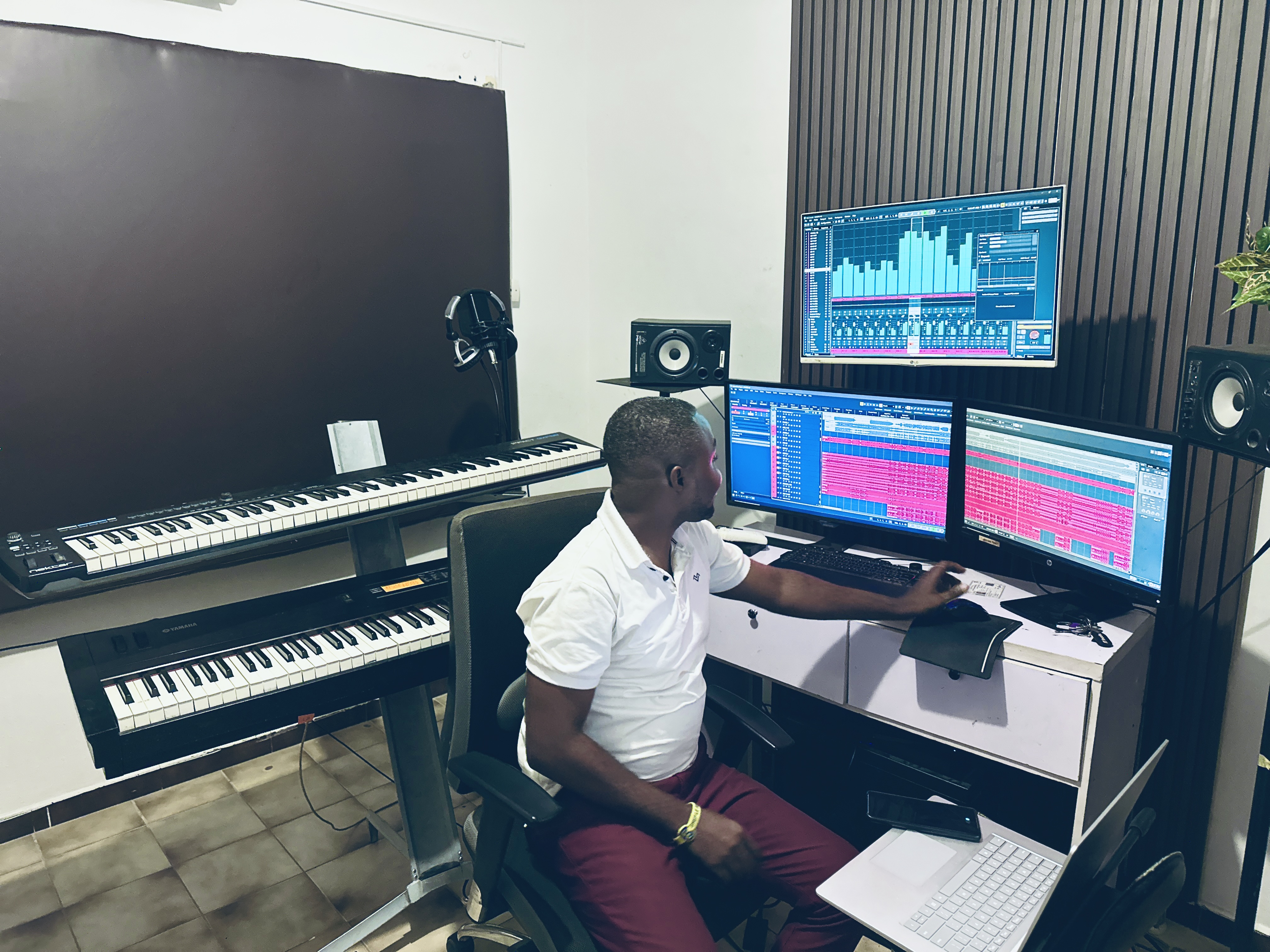 Producer working at studio desk